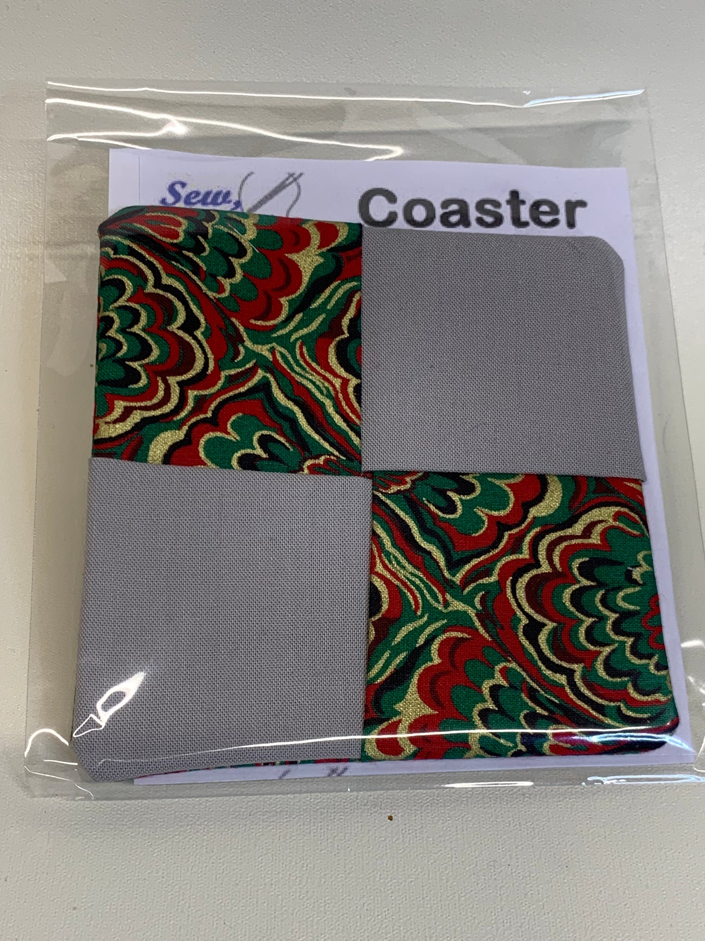 Coaster - Light grey with red/green swirls