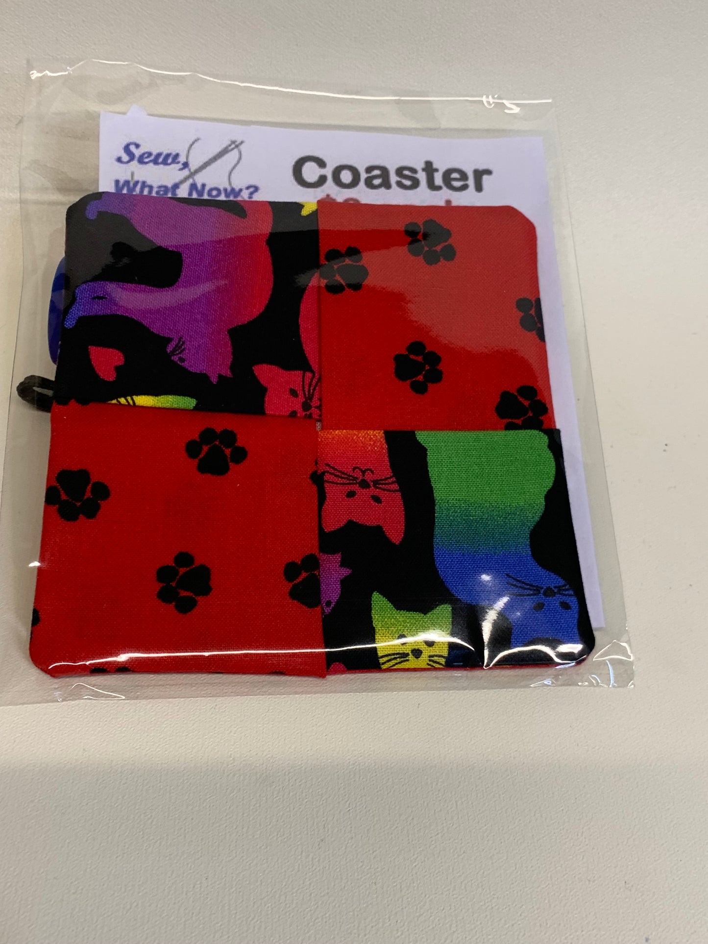 Coaster - cats with pawprints on red