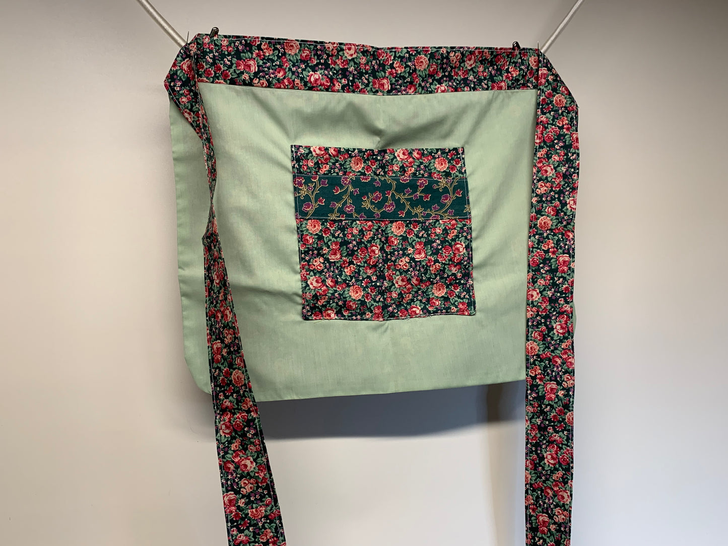Half Apron - reversable. Red roses and sage green with green accents