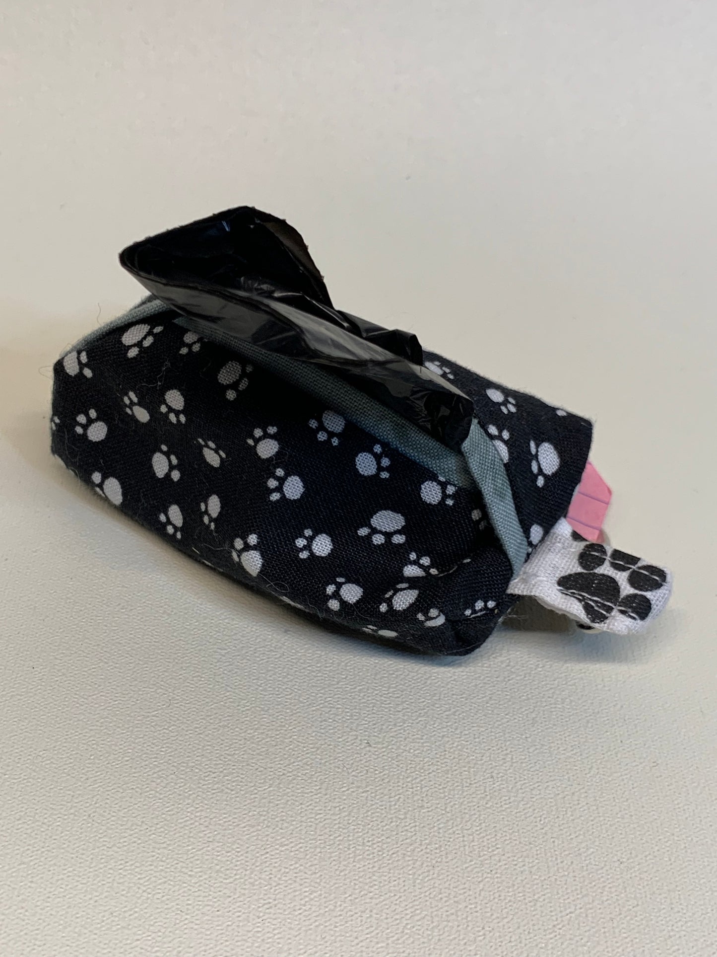 Dog Poo Bag Holder - black with white paw prints