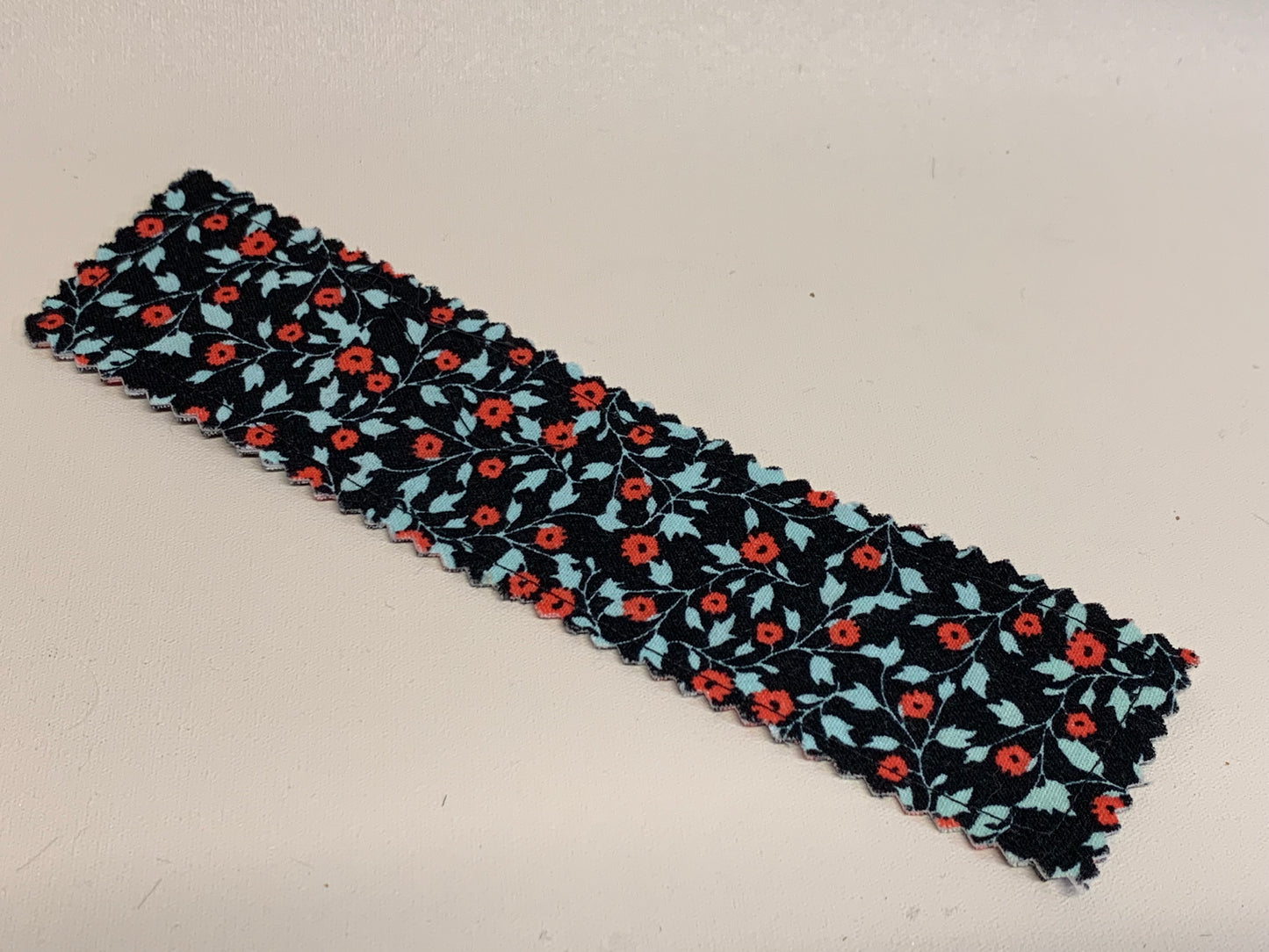 Traditional Bookmark -Black and red and blue flowers