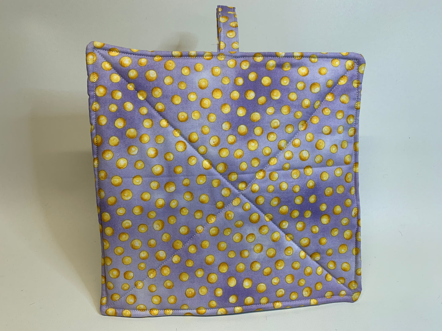 Potholder -light purple with yellow circles
