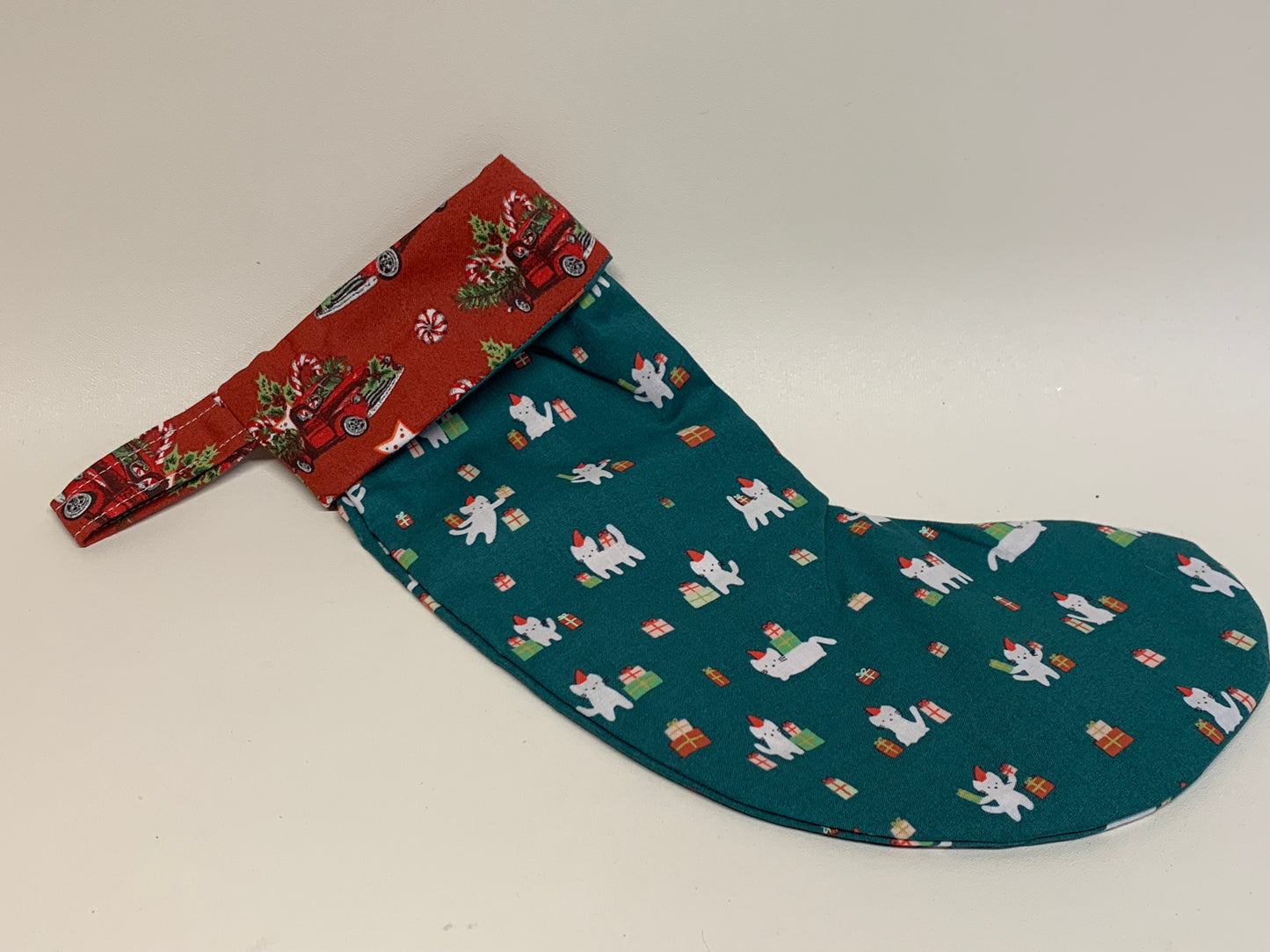 Small Christmas Stocking - Green with dogs - approx. 11" tall x 4.25" wide.