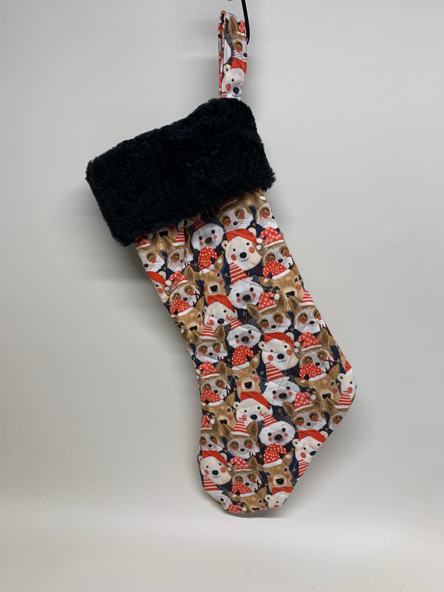 Quilted Christmas Stocking with faux fur cuff - Animals with red hats and black cuff - approx. 18" tall x 6" wide.