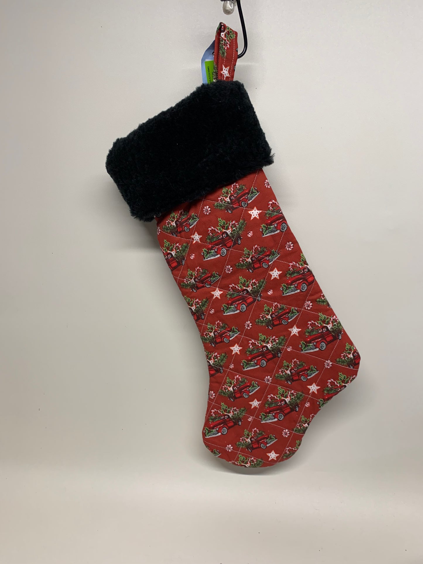 Quilted Christmas Stocking with faux fur cuff - Red with classic trucks and black cuff - approx. 18" tall x 6" wide.