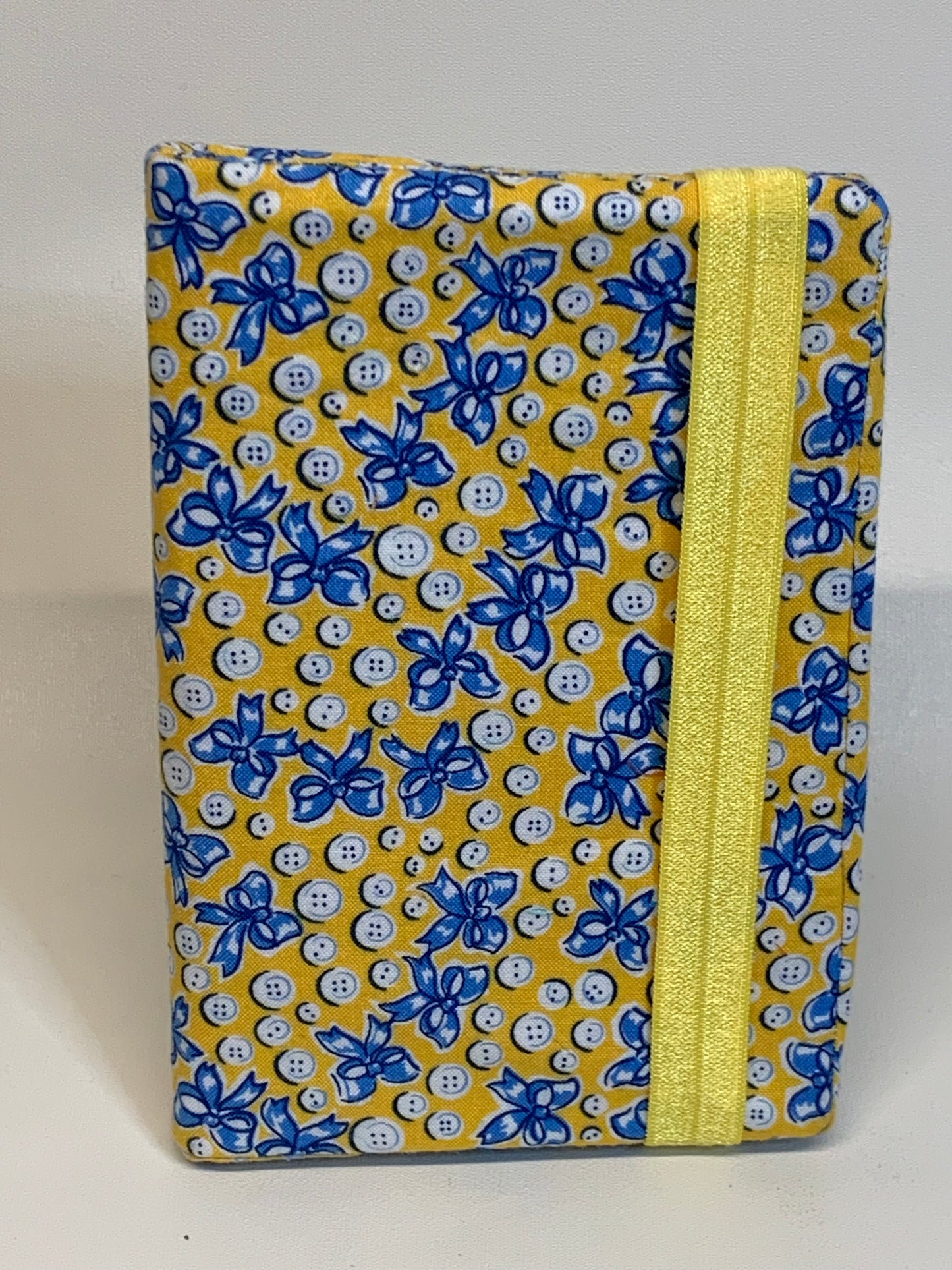 Notebook Cover - 4" X 6" - Yellow with blue ribbons and white buttons