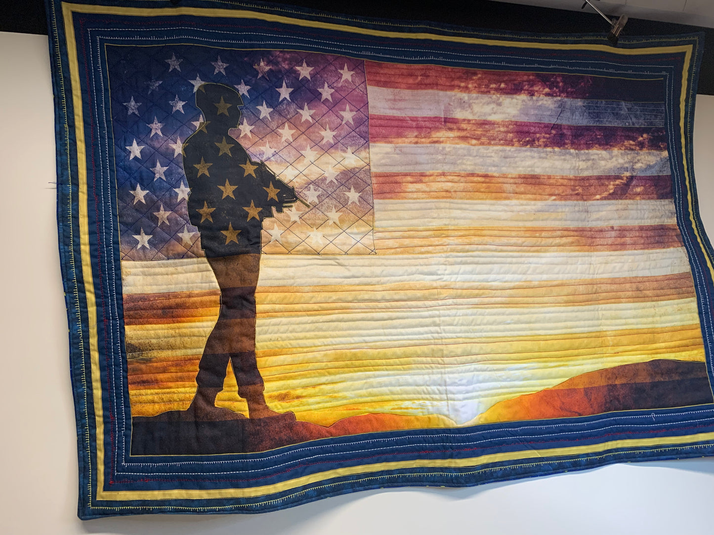 Soldier and flag quilted panel