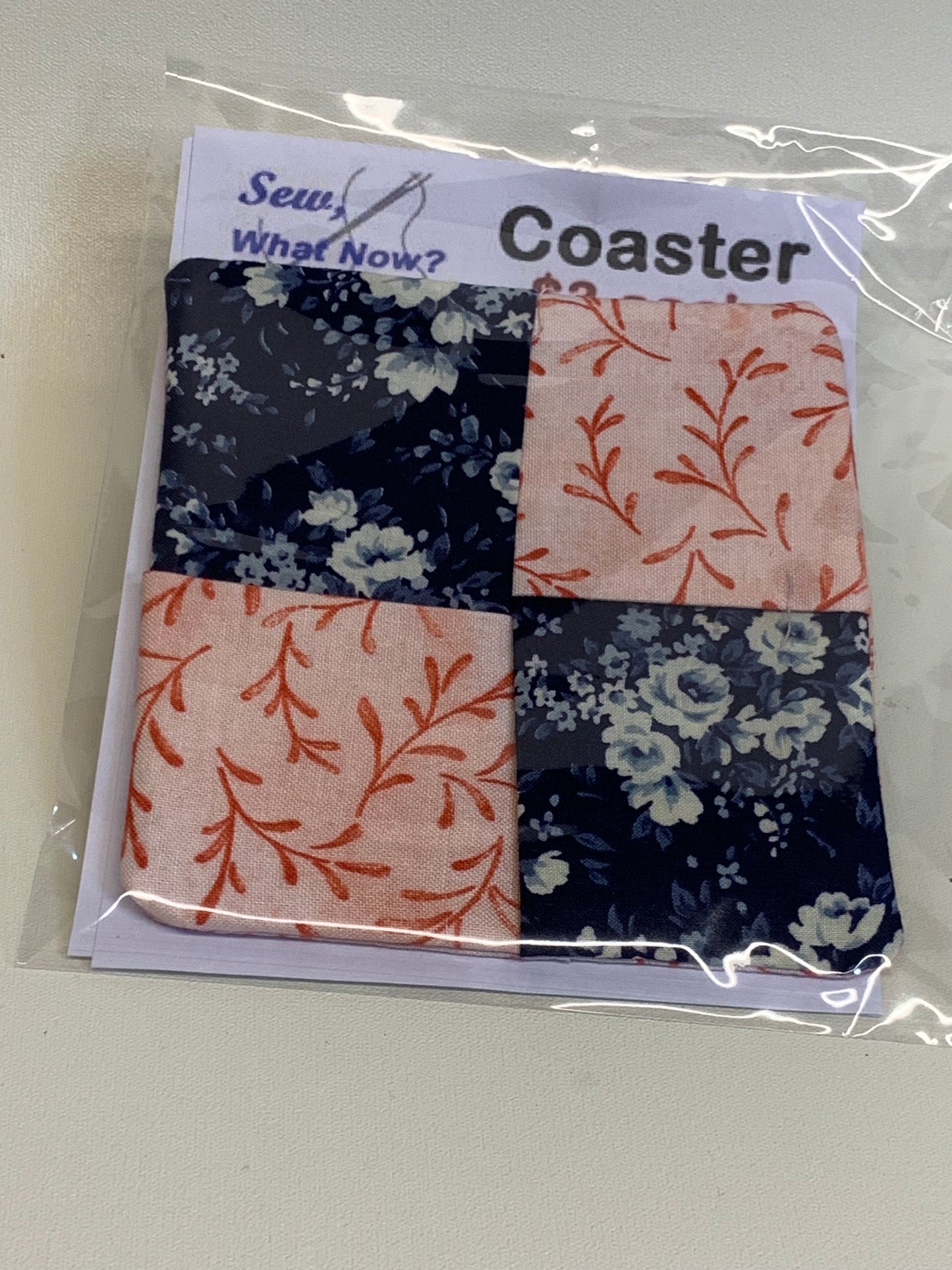 Coaster - blue with white flowers and pink with red foliage
