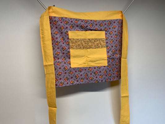Half Apron - reversable. Yellow and lavender with flowers.