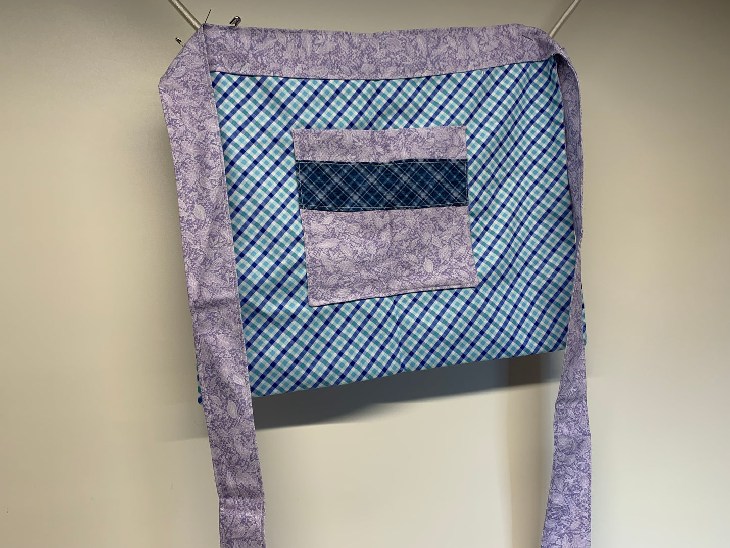 Half Apron - reversable. Lavender florals and blue plaid with dark blue accents