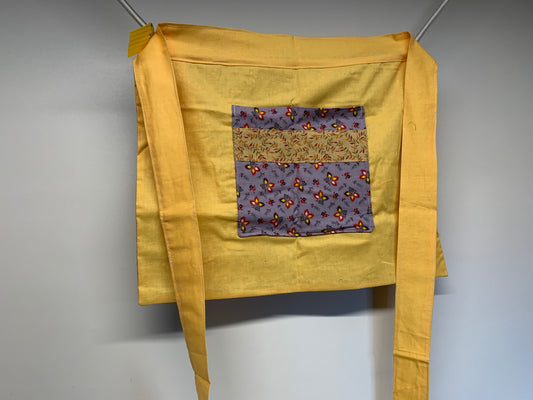 Half Apron - reversable. Yellow and lavender with flowers.