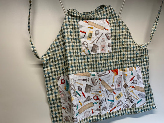 Full size Apron -Adjustable neckline. Tan/Gold/blue plaid with kitchen utensils