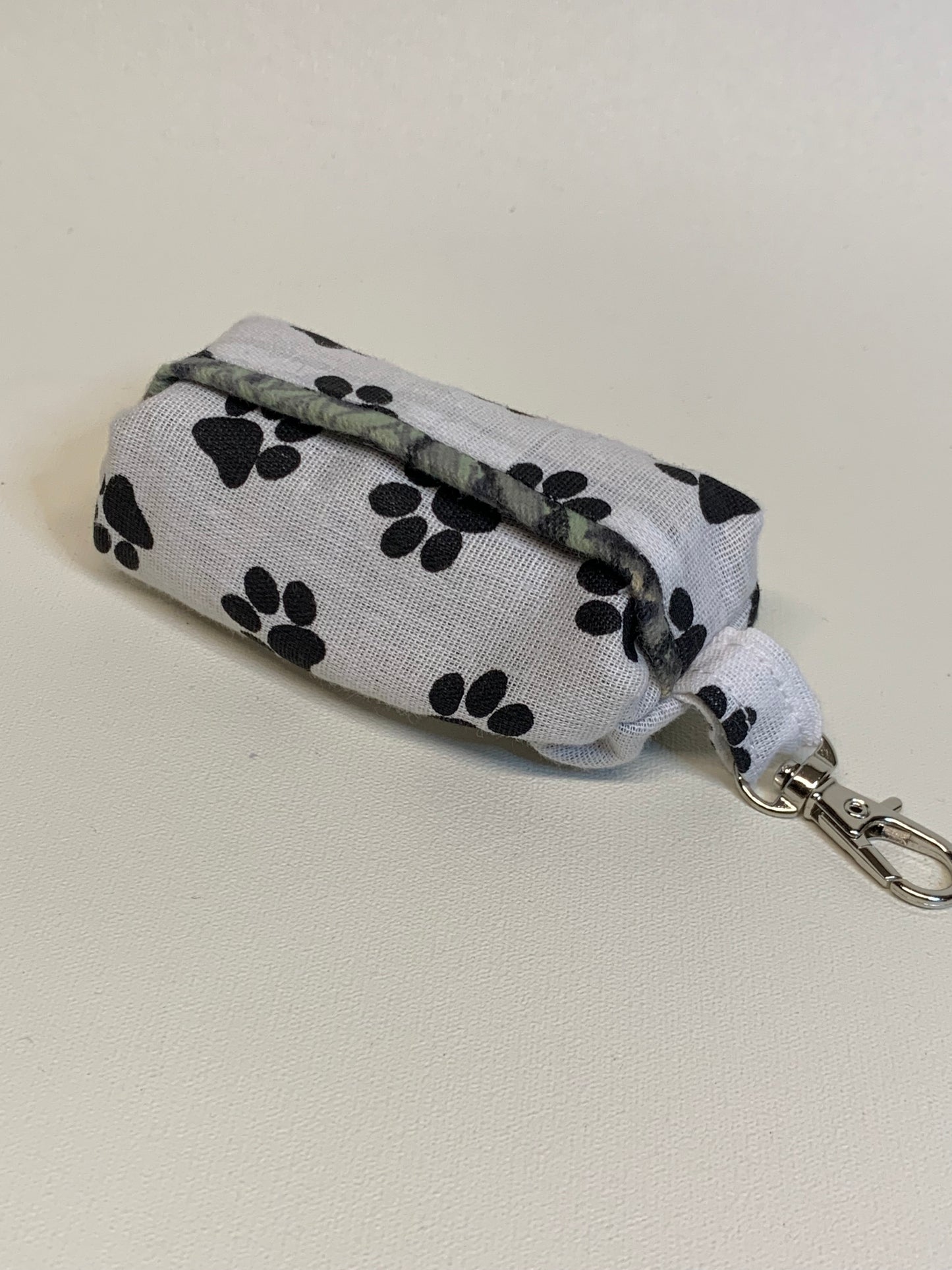 Dog Poo Bag Holder - white with black paw prints