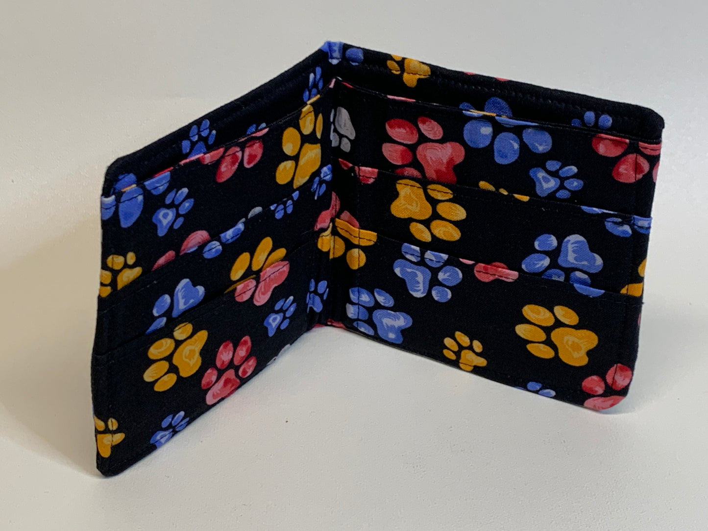 Bi-fold Wallet - Black with red/blue/yellow paw prints