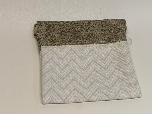 Unlined Pouch with Flex Frame Closure -  Tan vinyl top and white/gray geometric fabric bottom- 4" x 4.5."