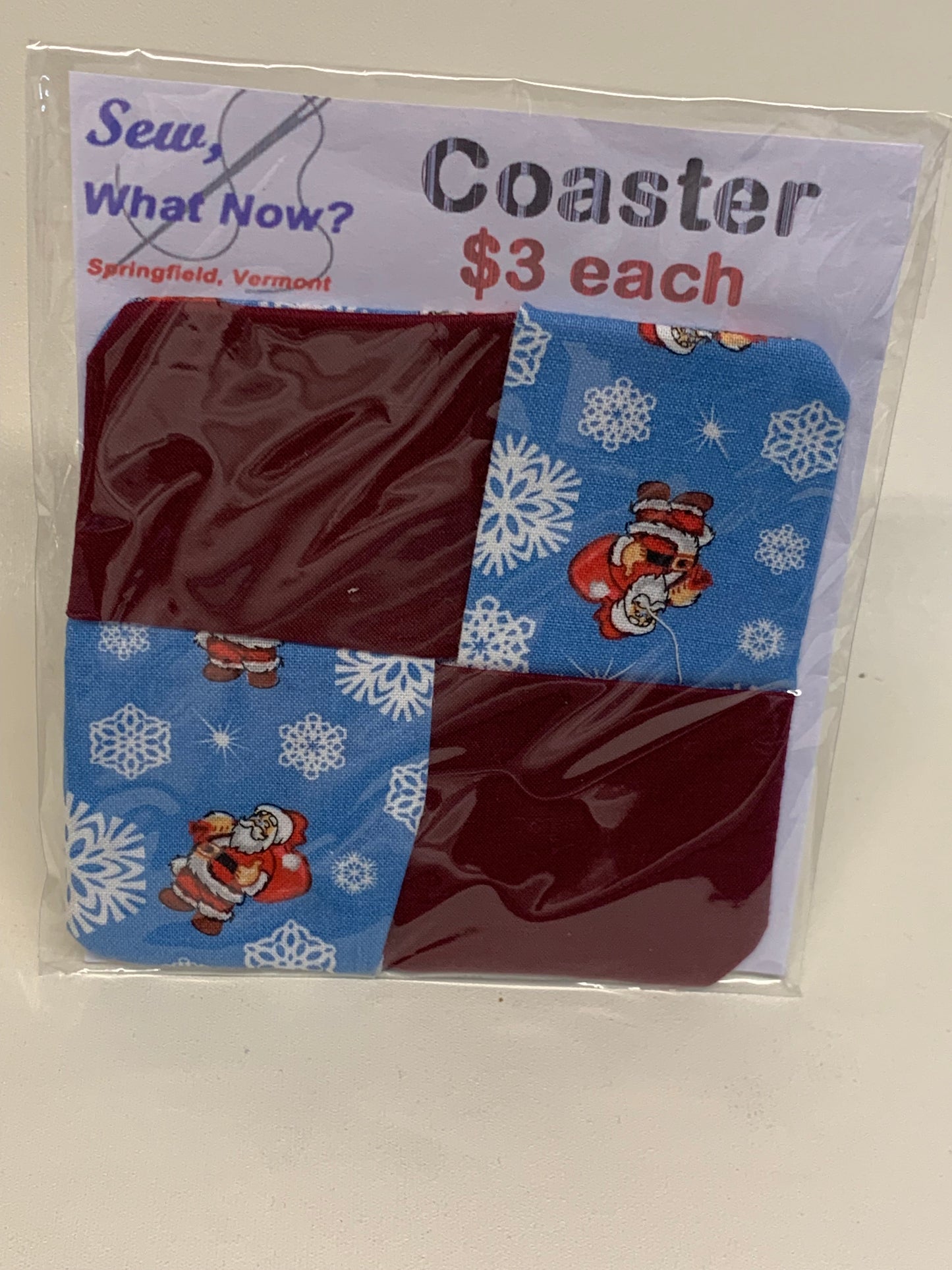 Coaster - Maroon with Blue Santa