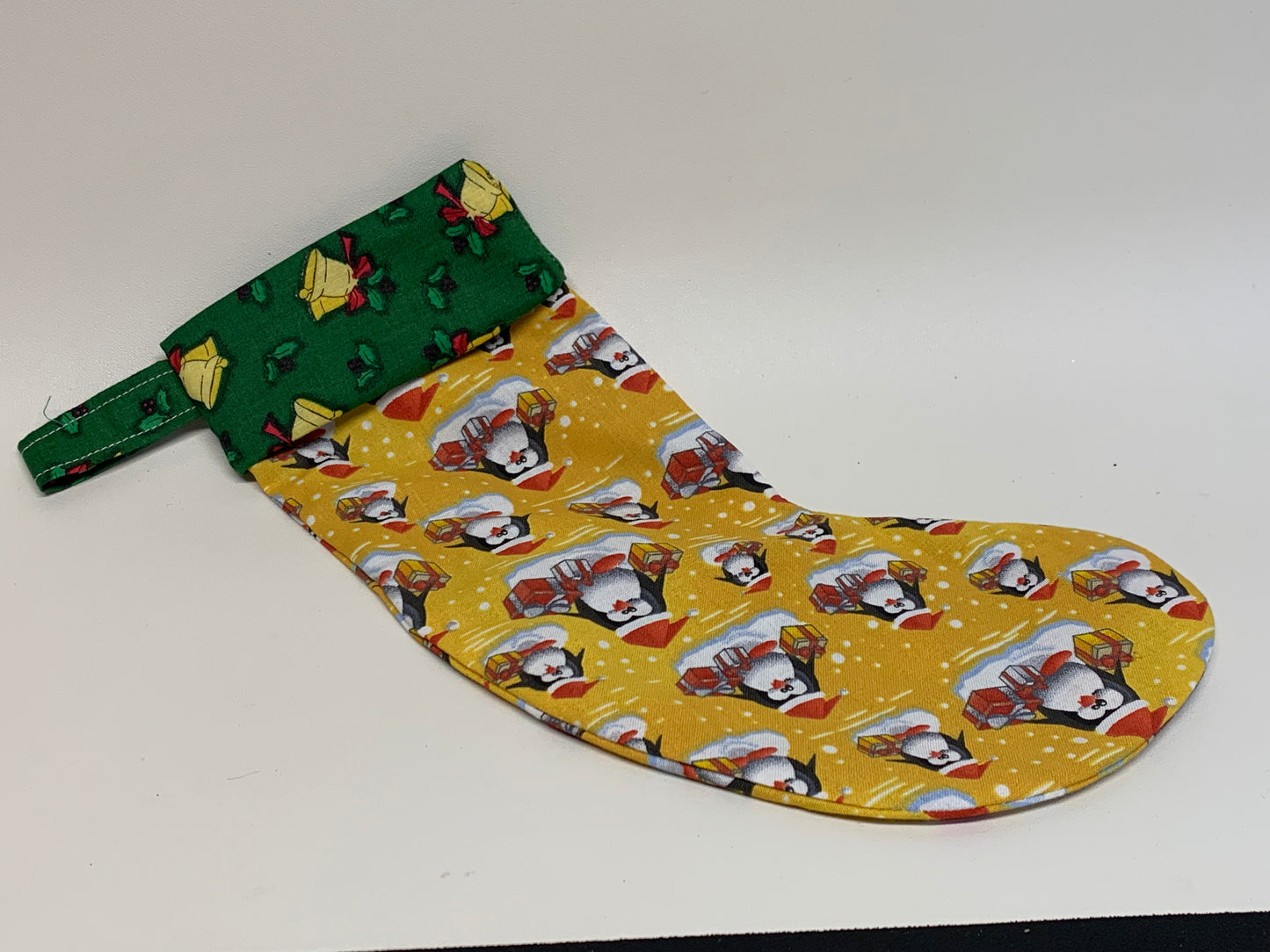 Small Christmas Stocking - Yellow with penguins - approx. 11" tall x 4.25" wide.