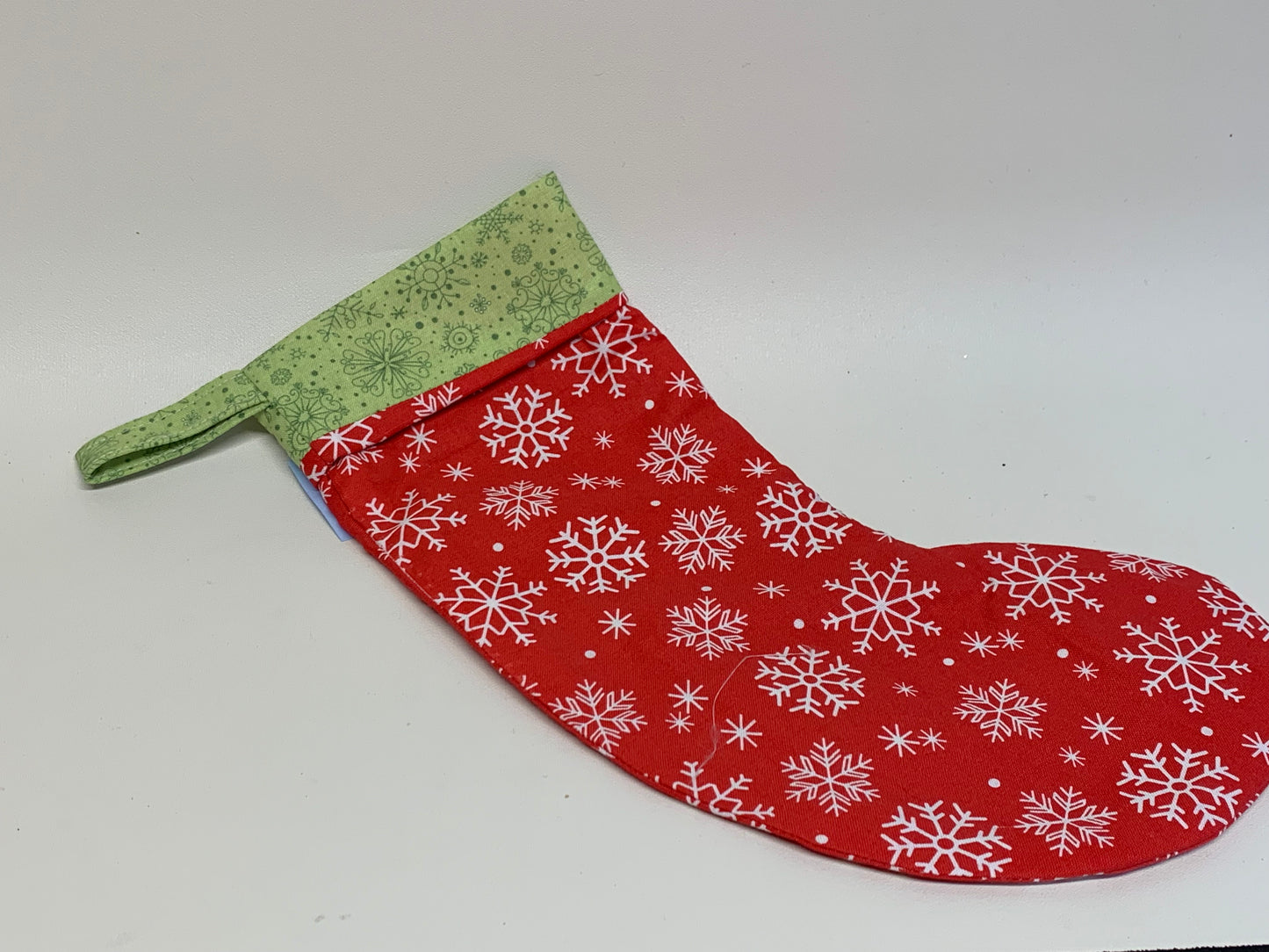 Small Christmas Stocking - Red with snowflakes - approx. 11" tall x 4.25" wide.