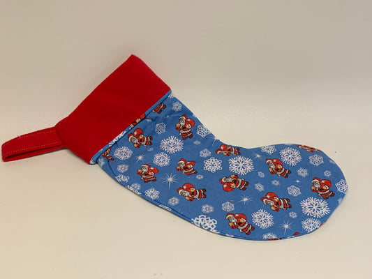 Small Christmas Stocking - Light blue with snowflakes and Santas- approx. 11" tall x 4.25" wide.