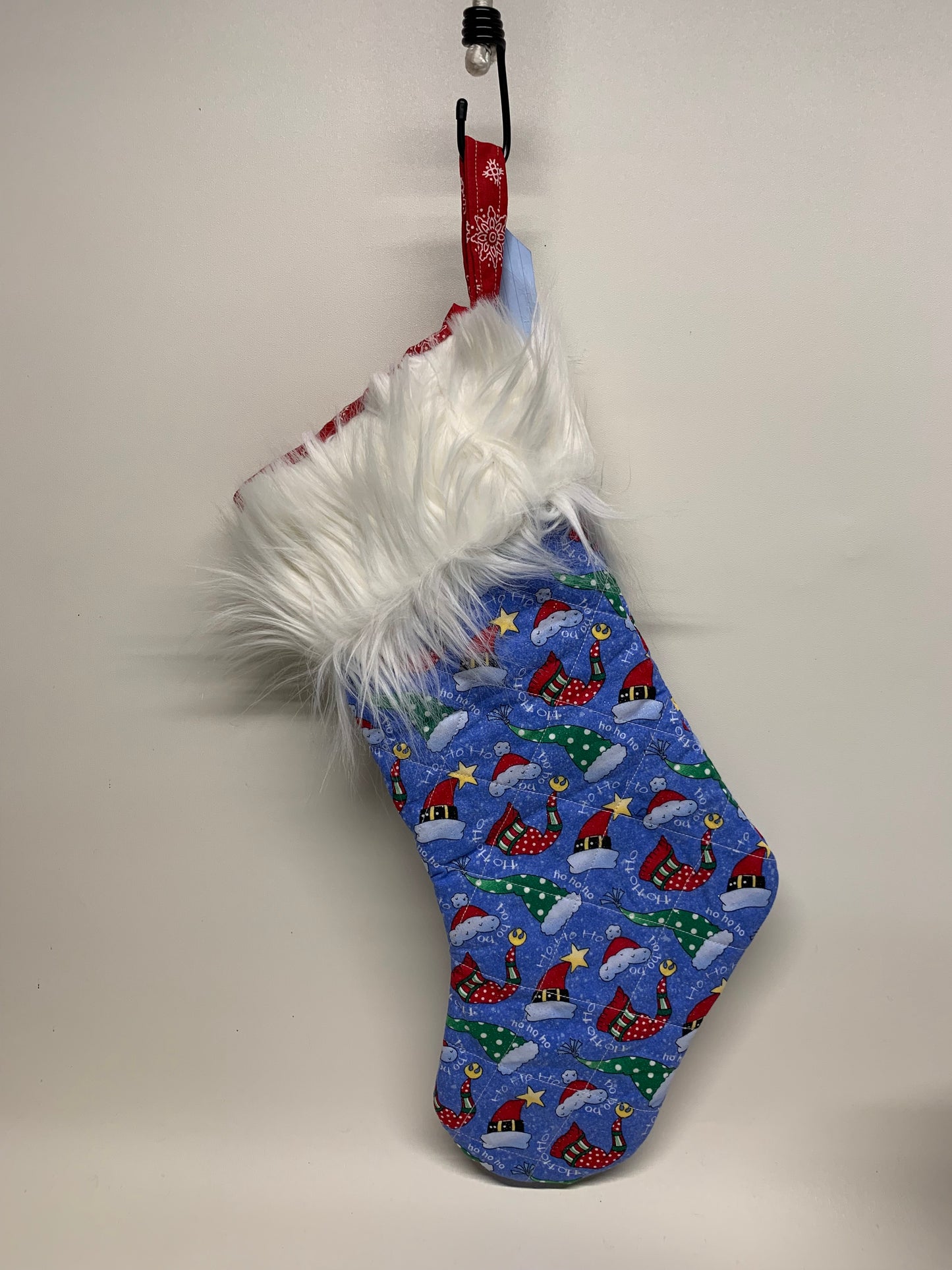 Quilted Christmas Stocking with faux fur cuff  - Light blue with hats and white cuff - approx. 18" tall x 6" wide.