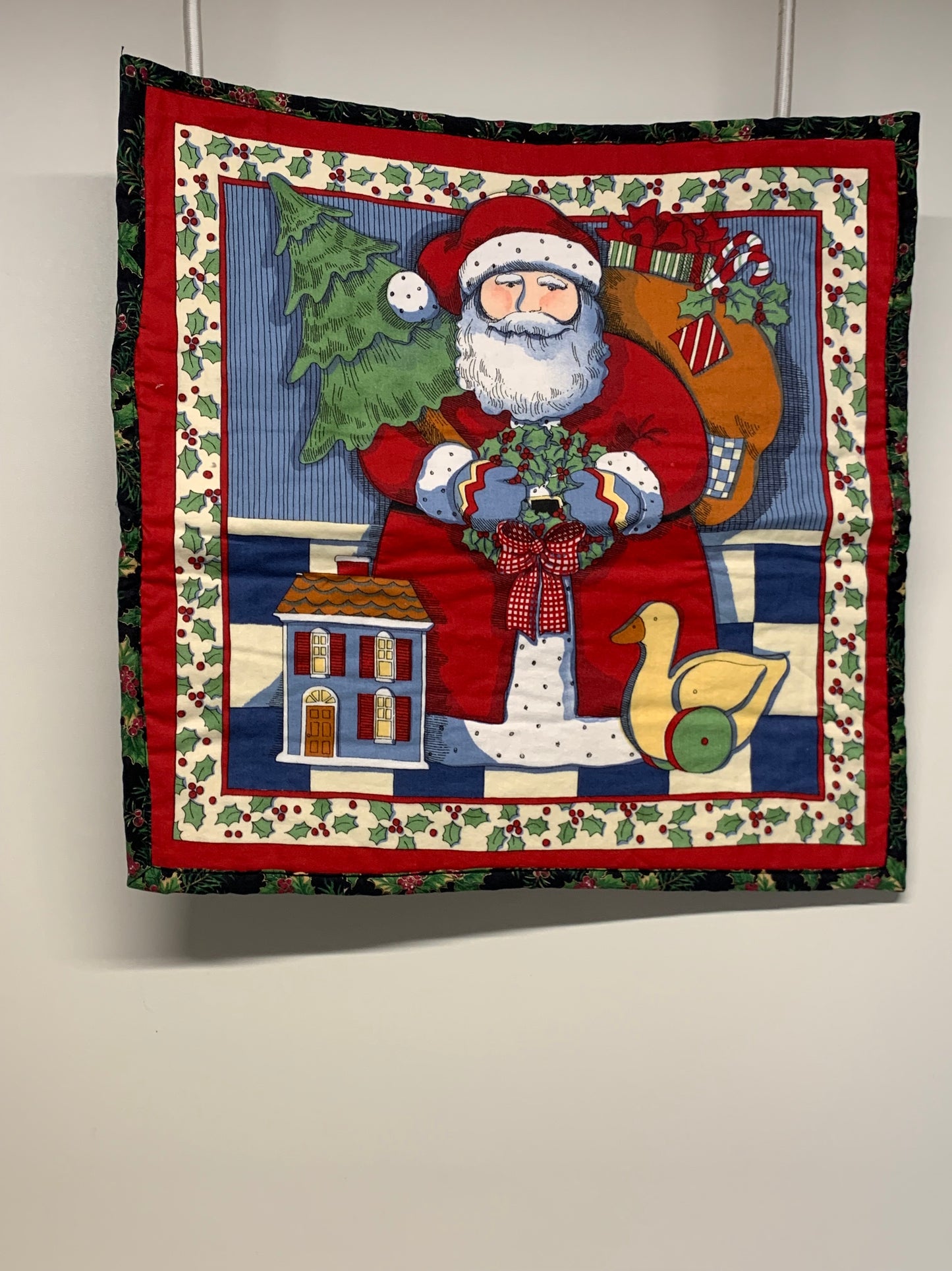 Wall Hanging - Santa with wreath   17.5" x 17.5"