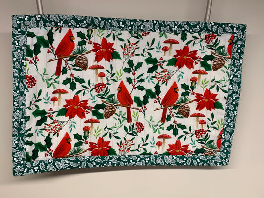 Placemat -Red cardinals and holly-   11 1/2" x 17"