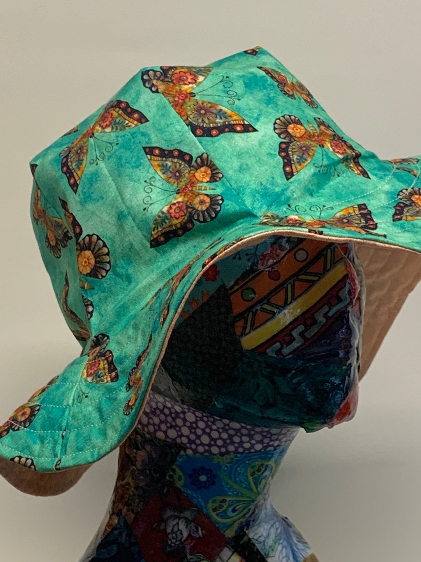 Bucket Hat  - Reversable Designs - Peach color on side one - Teal with butterflies on the reverse