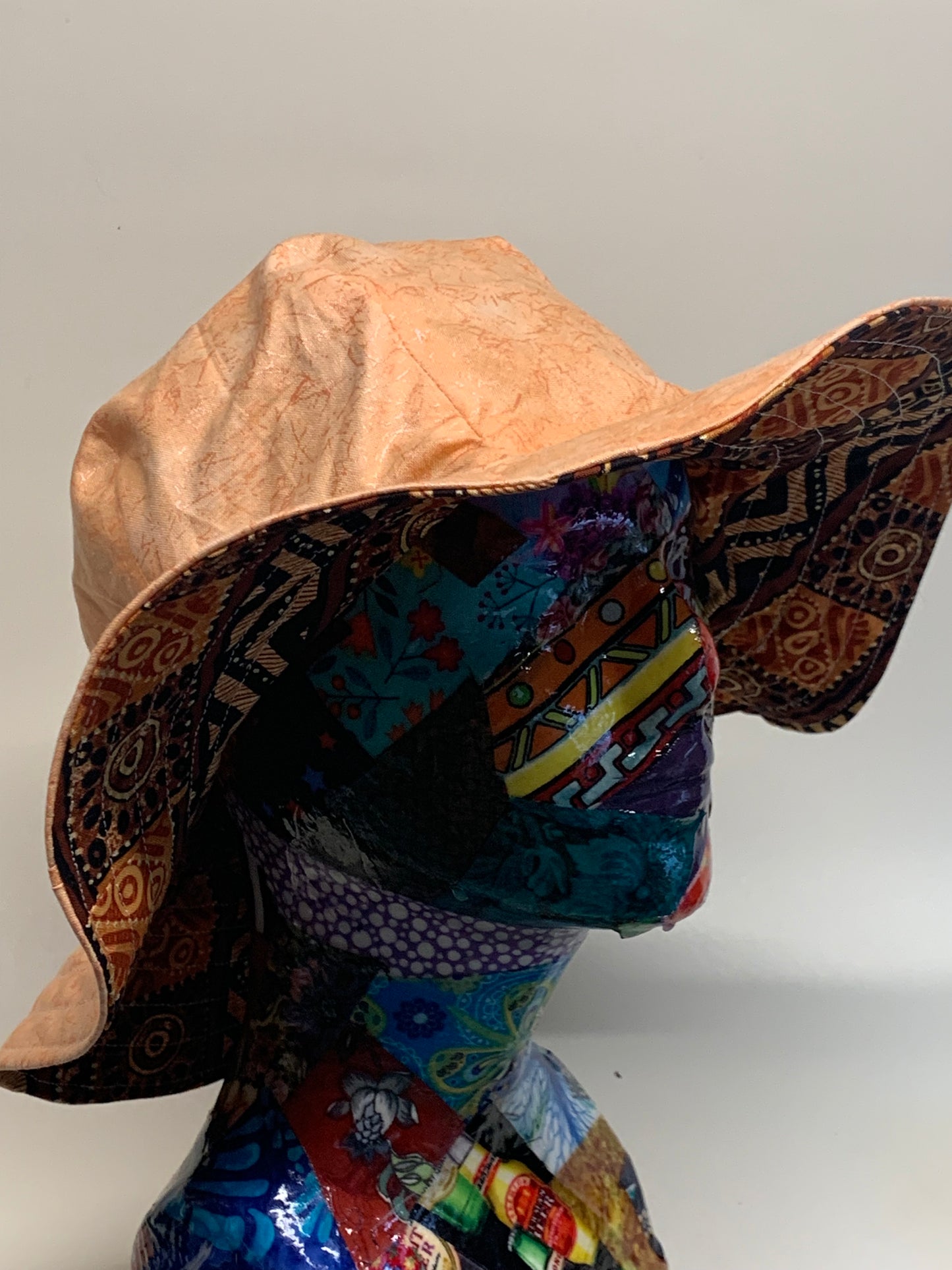 Bucket Hat  - Reversable Designs - Brown geometric on side one - Peach colored on the reverse