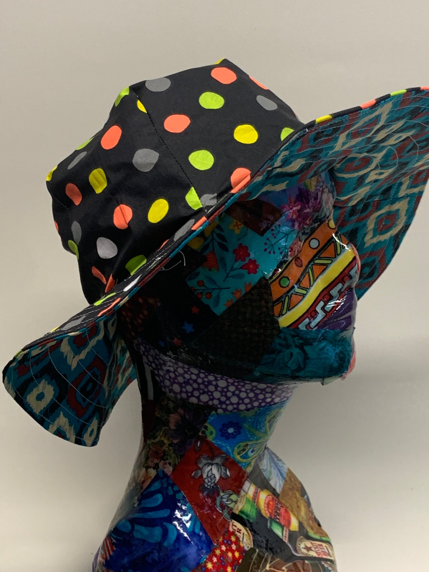 Bucket Hat  - Reversable Designs - Black with colored dots on side one - Blue with geometric on the reverse.