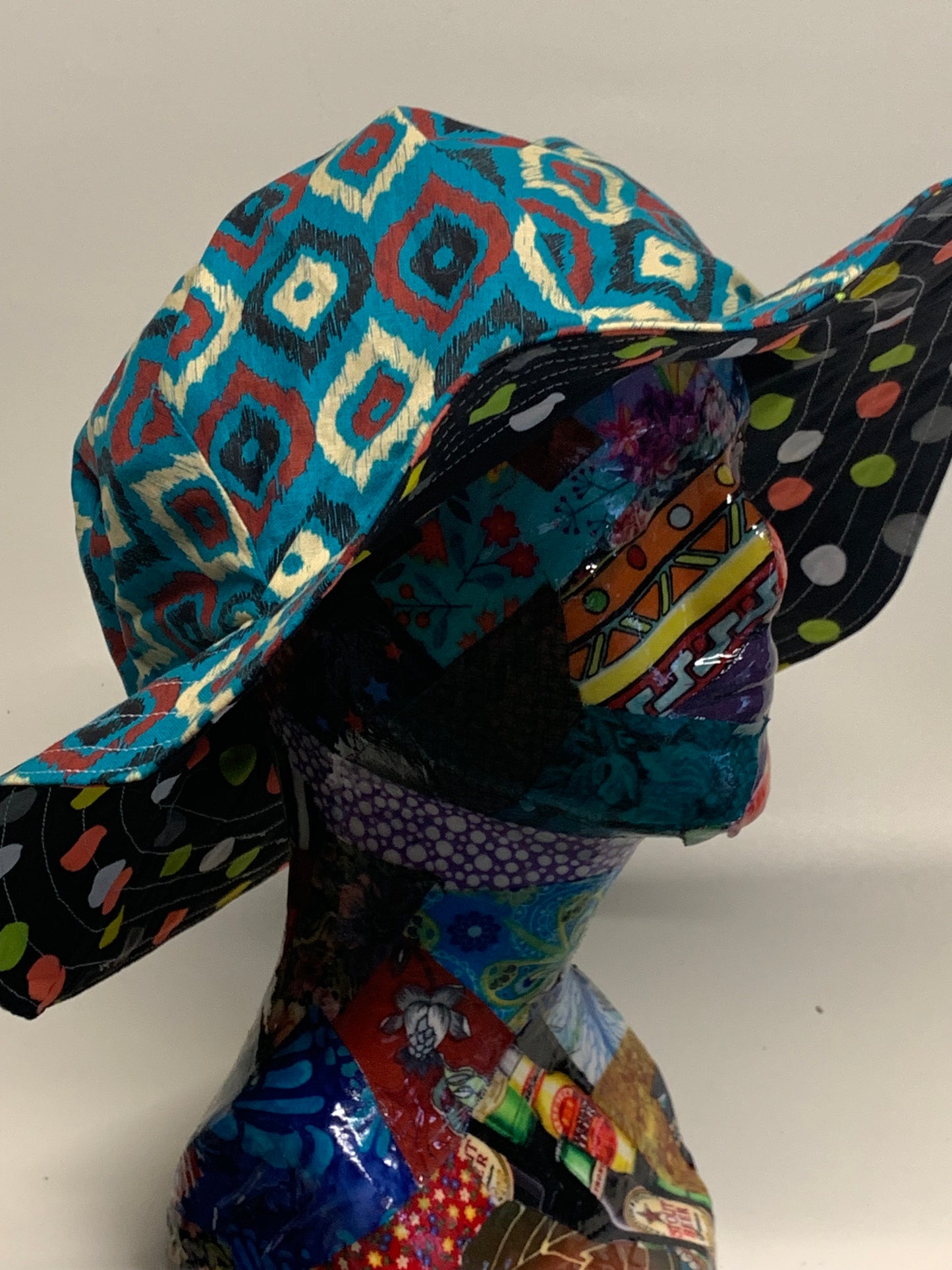 Bucket Hat  - Reversable Designs - Black with colored dots on side one - Blue with geometric on the reverse.