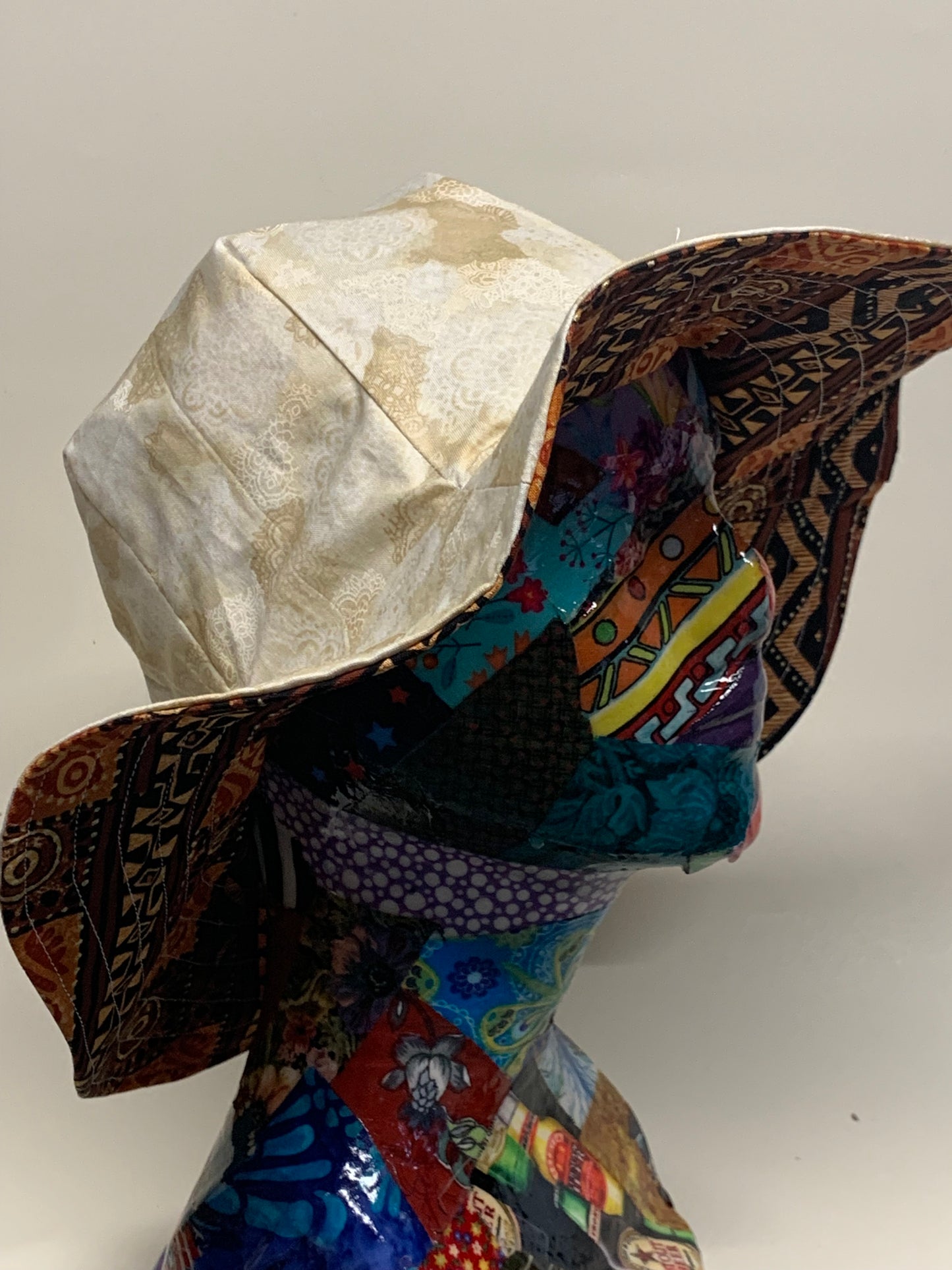 Bucket Hat  - Reversable Designs - Tan on side one - Tan with monkeys on the reverse.
