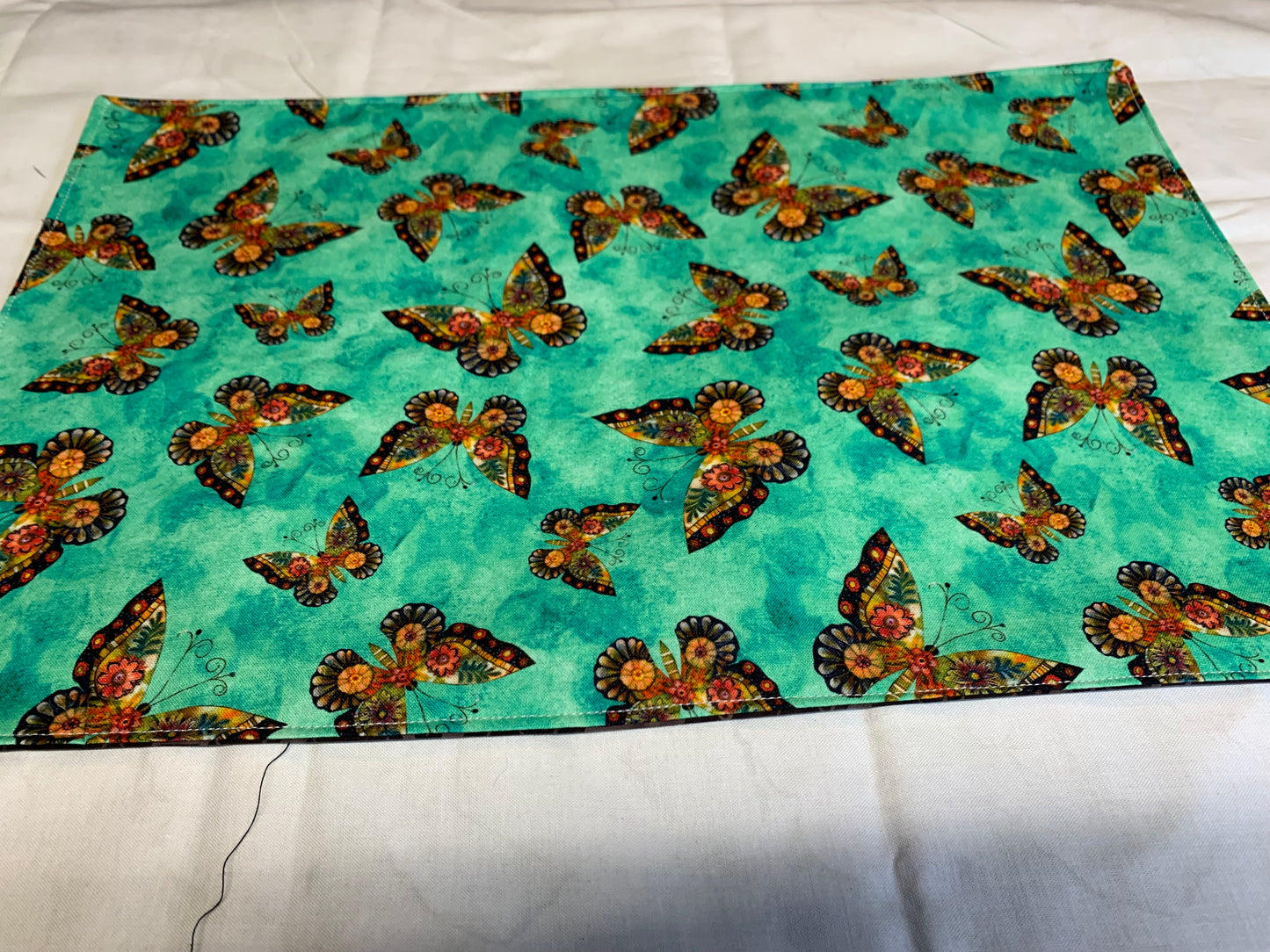 Placemat  - Butterflies on one side and brown geometrics on the other side - 11 1/2" x 17"