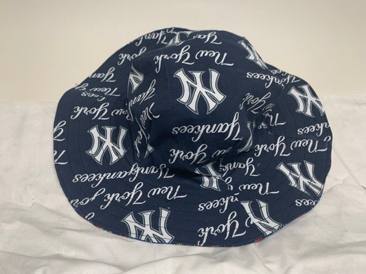 Bucket Hat  - Reversable Designs - NY Yankees on side one - Red, white and blue on the reverse.