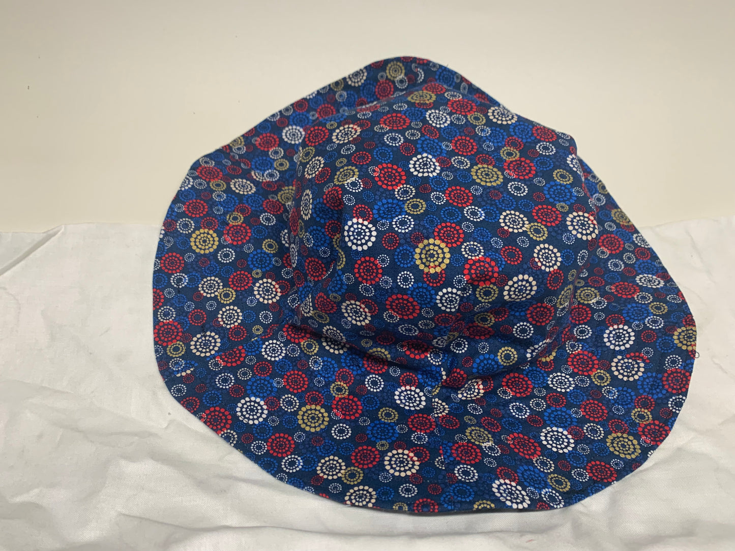 Bucket Hat  - Reversable Designs - NY Yankees on side one - Red, white and blue on the reverse.